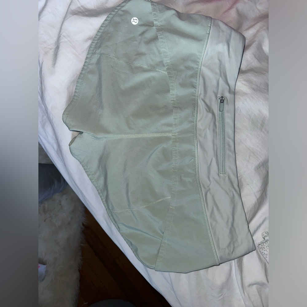 green lululemon shorts